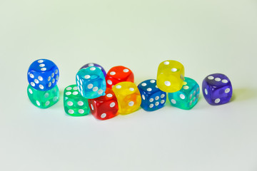 Colourful dices on white  background