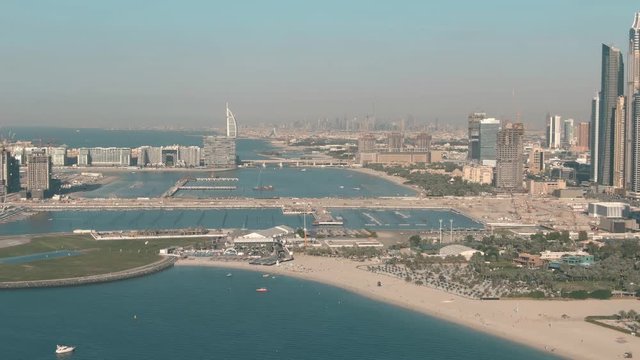 Aerial shot of Dubai coast and skyline as seen from the Dubai Marina area, UAE