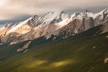 Sun shining on the mountains in Banff National park, Canada