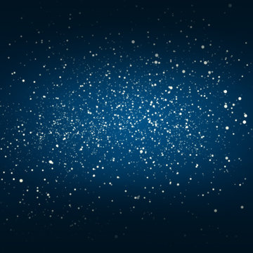 Night sky with stars and nebula, dark background.