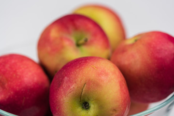 Fototapeta na wymiar Apples in a clear bowl. 