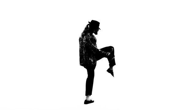 Silhouette of a young man dancer dancing on white background.