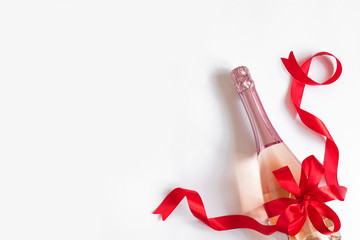 Champagne bottle with red bow