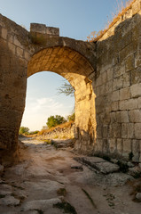 Orta Kapu gates of fortification wall in Chufut-Kale, medieval cave settlement of Crimean Karaites, Crimea