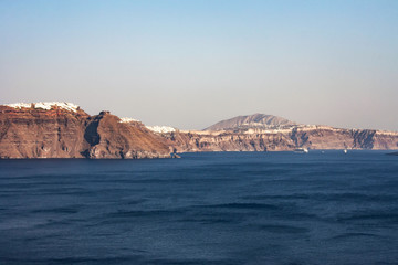 The coast of the Greek island of Santorini - the shores of a volcanic caldera filled with sea waters