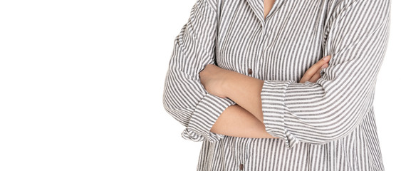 Woman wearing striped shirt folded arms make the sign or symbol of thinking something to make decision or act like confident and agreement with isolated background.