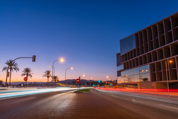 Centered exposure night shot in the promenade in the bay of Palma de Mallorca, with the car trails...