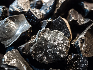 Pieces of graphite extracted from a mine. - 312561955