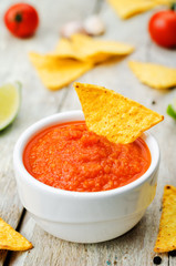 blended red salsa on the wood background