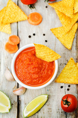 blended red salsa on the wood background
