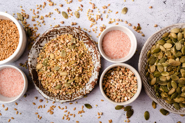 Various cereals and grains in bowls, healthy diet