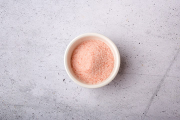 Small pink salt in a white bowl
