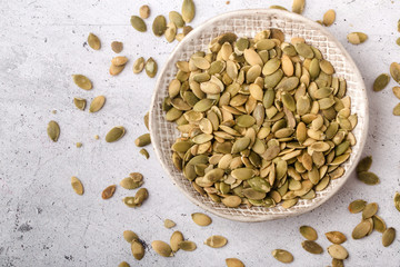 Pumpkin seeds in a ceramic plate