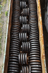 Railway carriage loaded with new train wheels