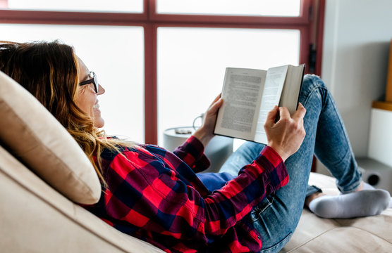 Woman reading at home