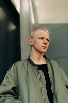 Portrait of young man with tattoo on his face