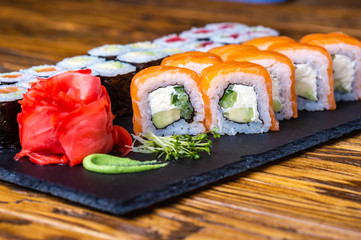 slices of sushi salmon on plate