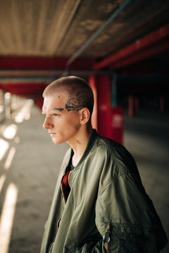 Portrait Of Young Man With Tattoo On His Face