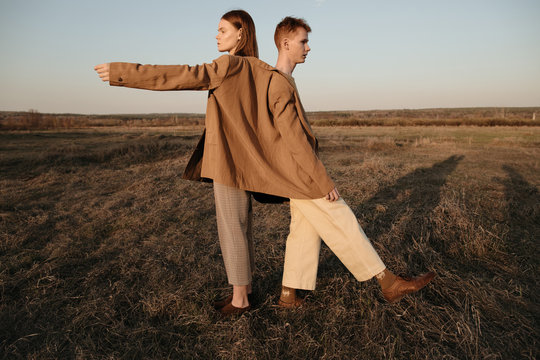 Brother and sister in field