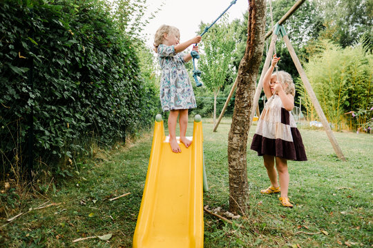 stock photo of little girl playing in the backyard