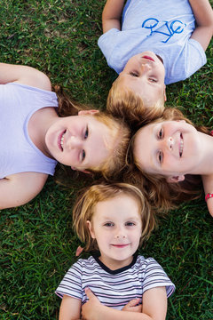 Cute Kids On Grass