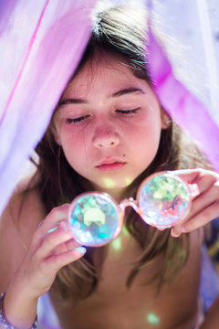Girl With Purple Kaleidoscopic Glasses