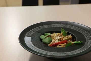 chicken with rice and vegetables in pan