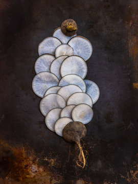 sliced black radishes