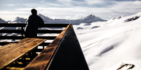 man on top of mountain