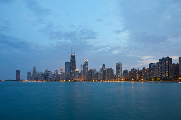 Fototapeta na wymiar Chicago Skyline at blue hour, seen from the North beach, Chicago, Illinois, United States