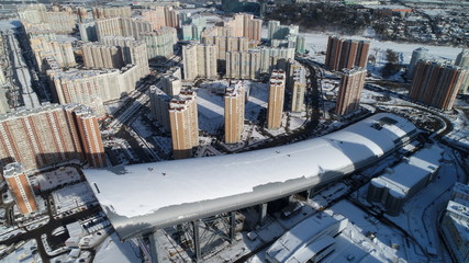 Pavshinskaya poyma district of Krasnogorsk, Moscow region, Russia. Mitino District is administrative district  of Moscow. Commuter town with very dense houses. View above. Winter snow day
