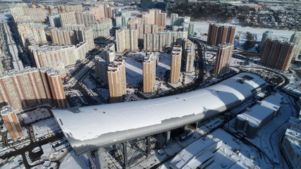 Pavshinskaya poyma district of Krasnogorsk, Moscow region, Russia. Mitino District is administrative district  of Moscow. Commuter town with very dense houses. View above. Winter snow day