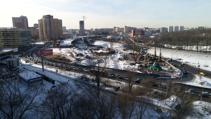 Pavshinskaya poyma district of Krasnogorsk, Moscow region, Russia. Mitino District is administrative district  of Moscow. Commuter town with very dense houses. View above.  Winter snow day