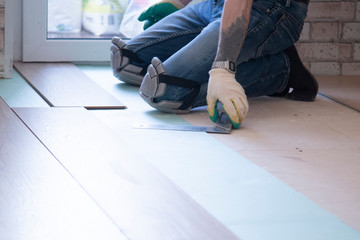Laminated floor.Installing laminate on the floor.