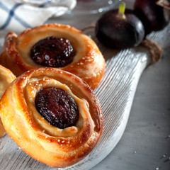 Fragrant baked goods with figs. Delicious pastries.