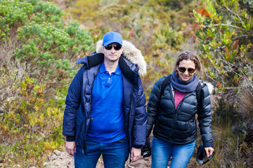 Young couple exploring nature at a beautiful paramo at the department of Cundinamarca in Colombia