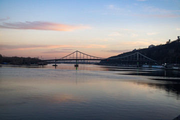 Fototapeta na wymiar Bridge at sunset. Beautiful landscape.