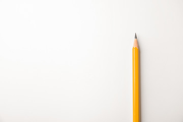 Sharp pencil isolated on white, top view