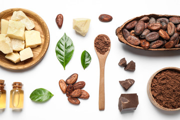 Composition with organic cocoa butter on white background, top view