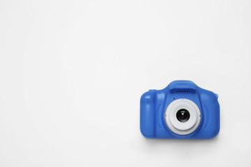 Toy camera isolated on white, top view. Classic blue - color of the Year 2020