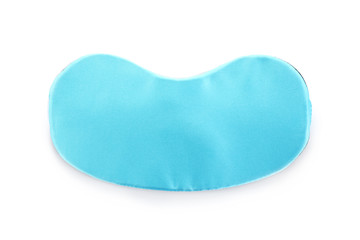 Turquoise sleeping eye mask isolated on white, top view. Bedtime