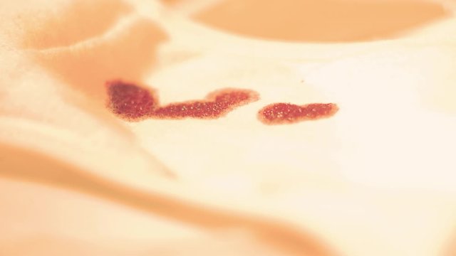 Close up dirty white panties in blood. Menstruation concept. Woman hygiene products