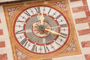 A detail of the clock painted on the bell tower of the St. Cristina little church in Val Gardena, recently restored it shows all its original vivid colors