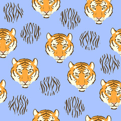 Vector seamless pattern with tiger heads. Animal print