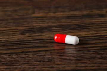 Red and white pill