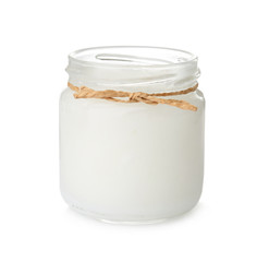 Organic coconut oil in jar isolated on white. Healthy cooking