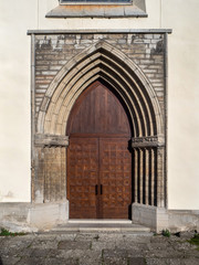 Fototapeta premium Old gates, doors, handles and locks in the old city of Tallinn