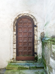 Fototapeta na wymiar Old gates, doors, handles and locks in the old city of Tallinn
