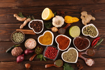 Spices and herbs on table. Food and cuisine ingredients and lemon