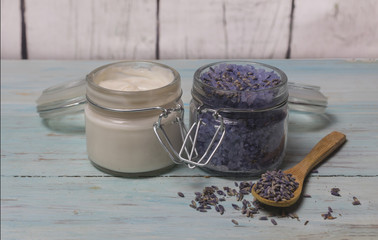 Facial cream and lavender bath salt. Cosmetics and natural medicine.